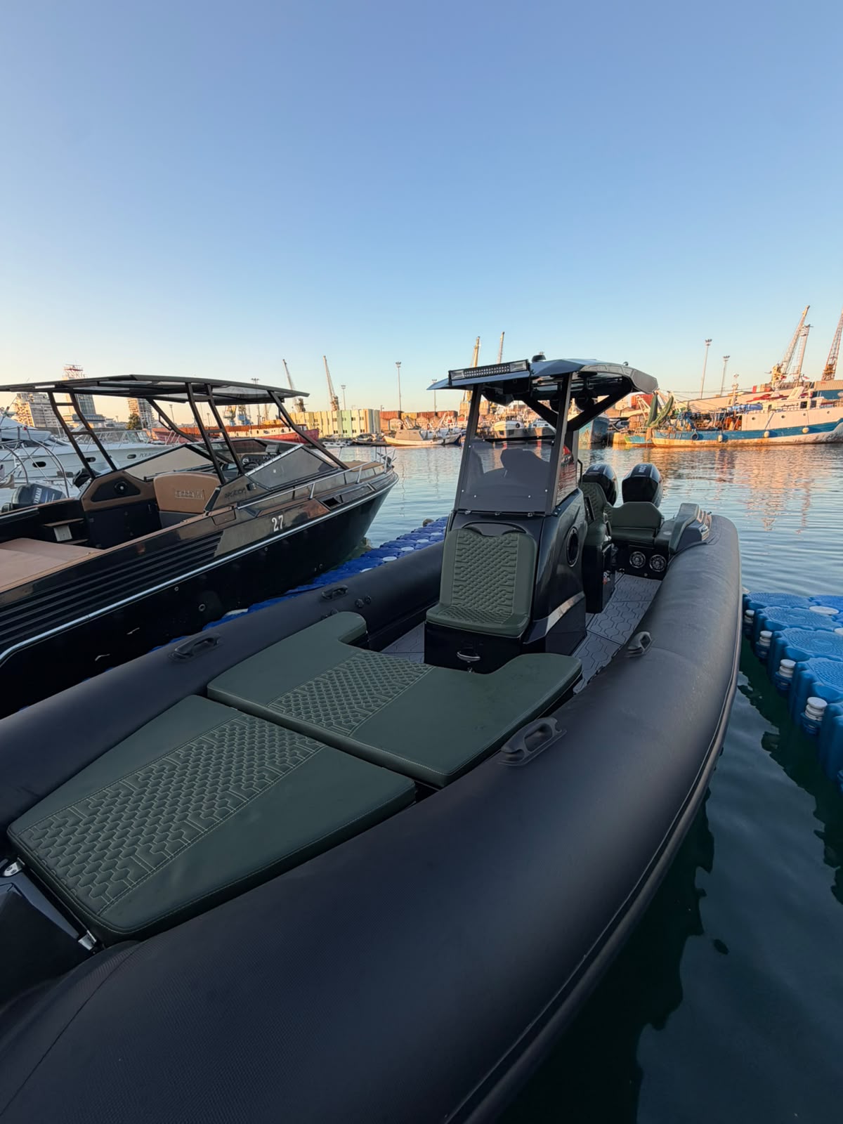 RIB 9.5 with twin Mercury 300 V8 engines at the dock